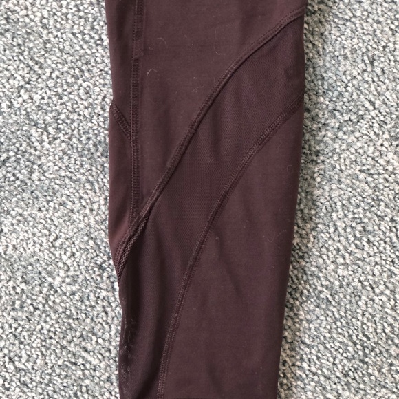 Lululemon leggings with gold zipper pockets and mesh ankle detail - Picture 2 of 4